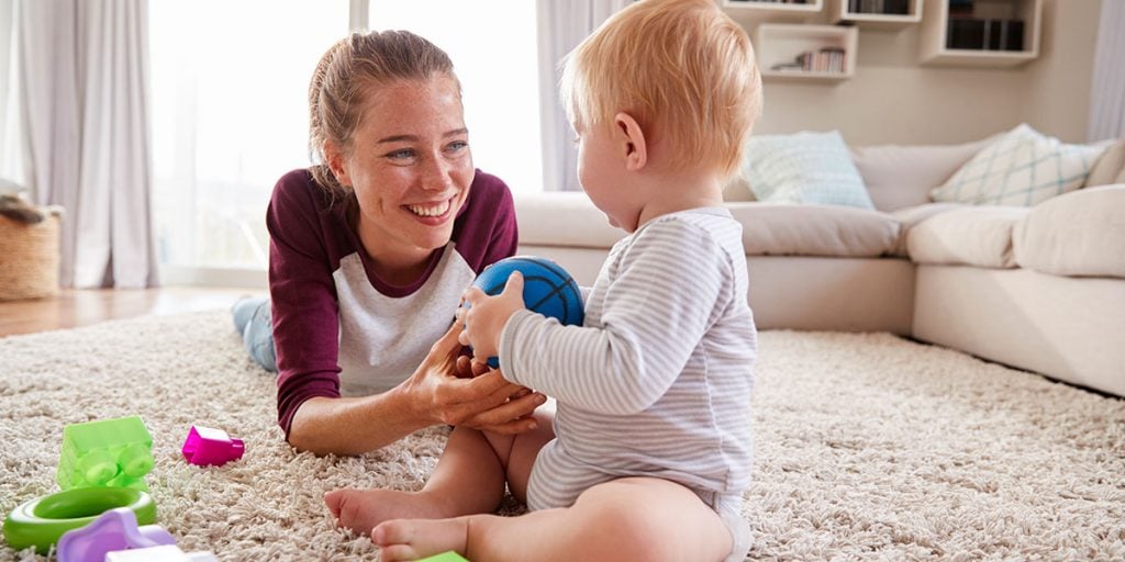 Playing ball with a baby