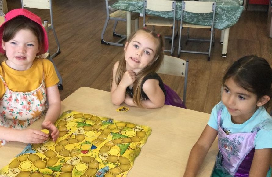 Children playing games at childcare centre