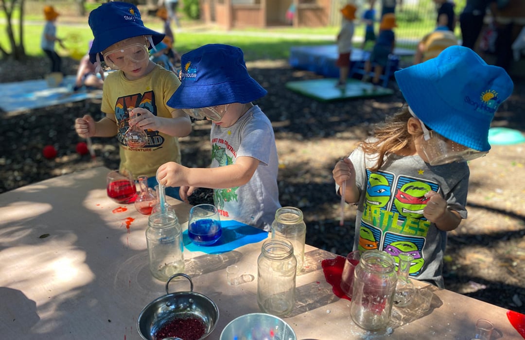 Children engaging in a science experiment